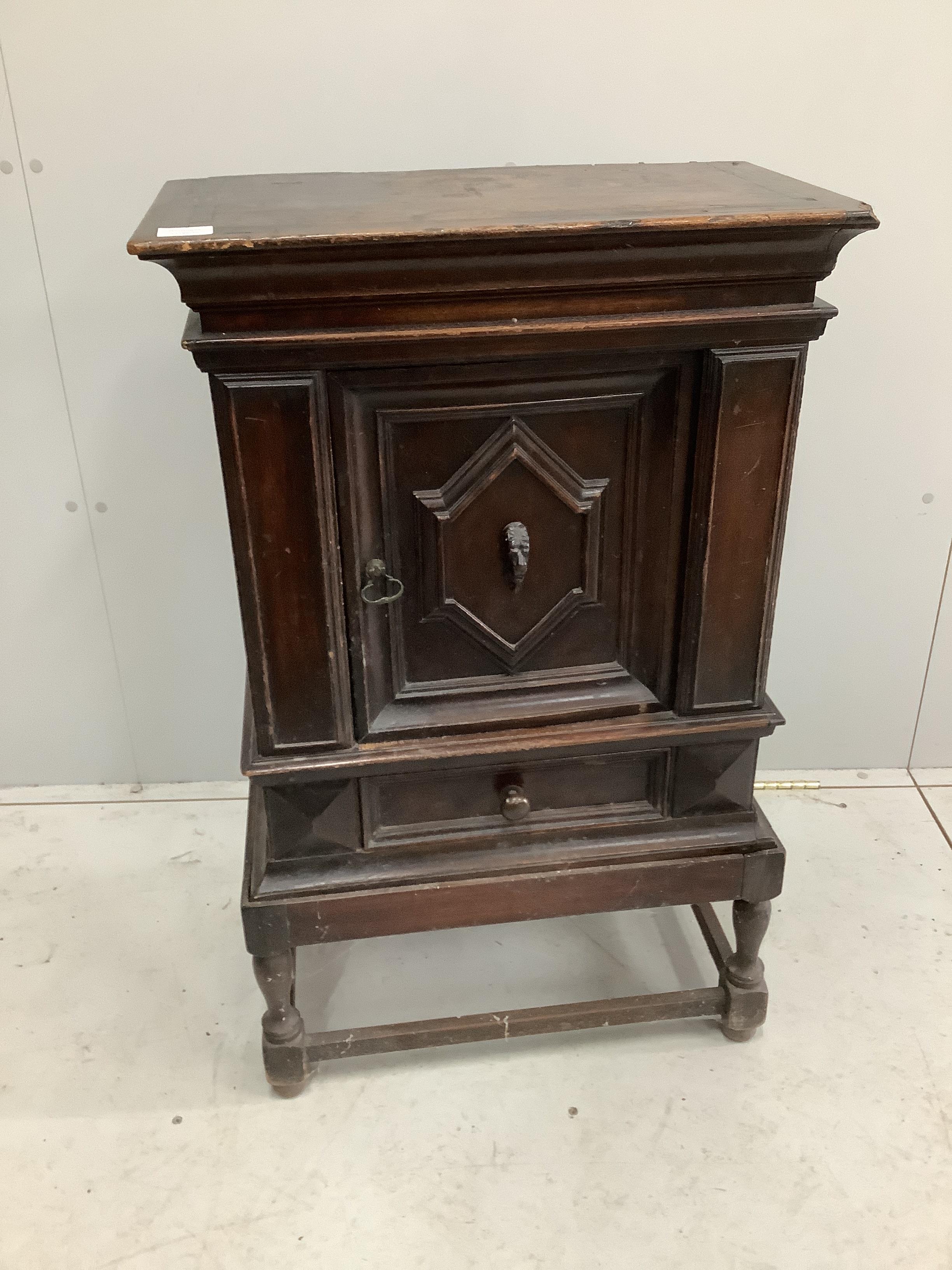 An 18th century oak spice cabinet, on later stand, width 58cm, depth 33cm, height 93cm